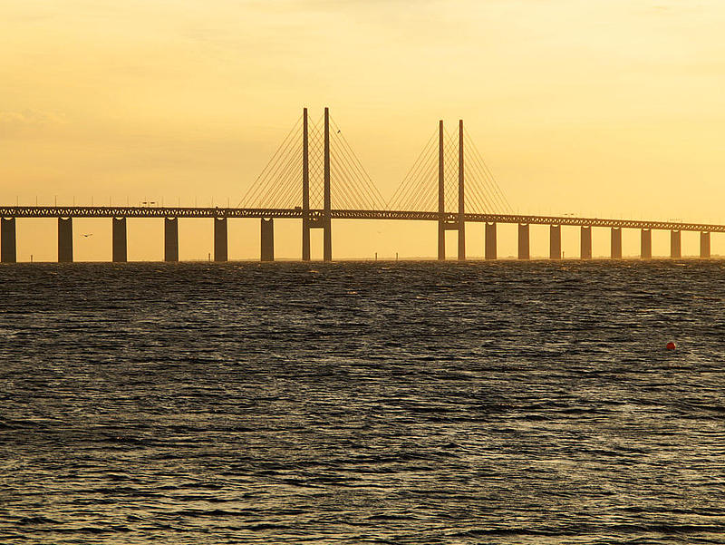 Water view of the Öresundbridge, the bridge between Copenhagen and Malmo in the evening sun.